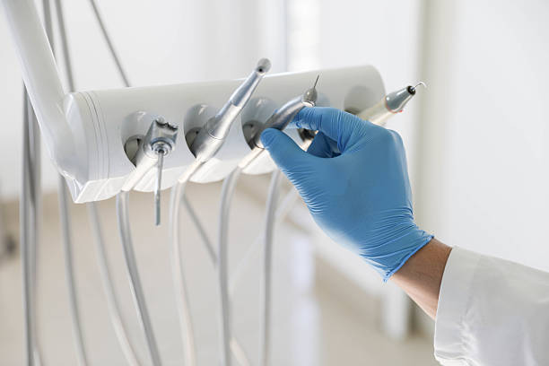 Professional Dental Implants technician working in Hampton Manor, NY